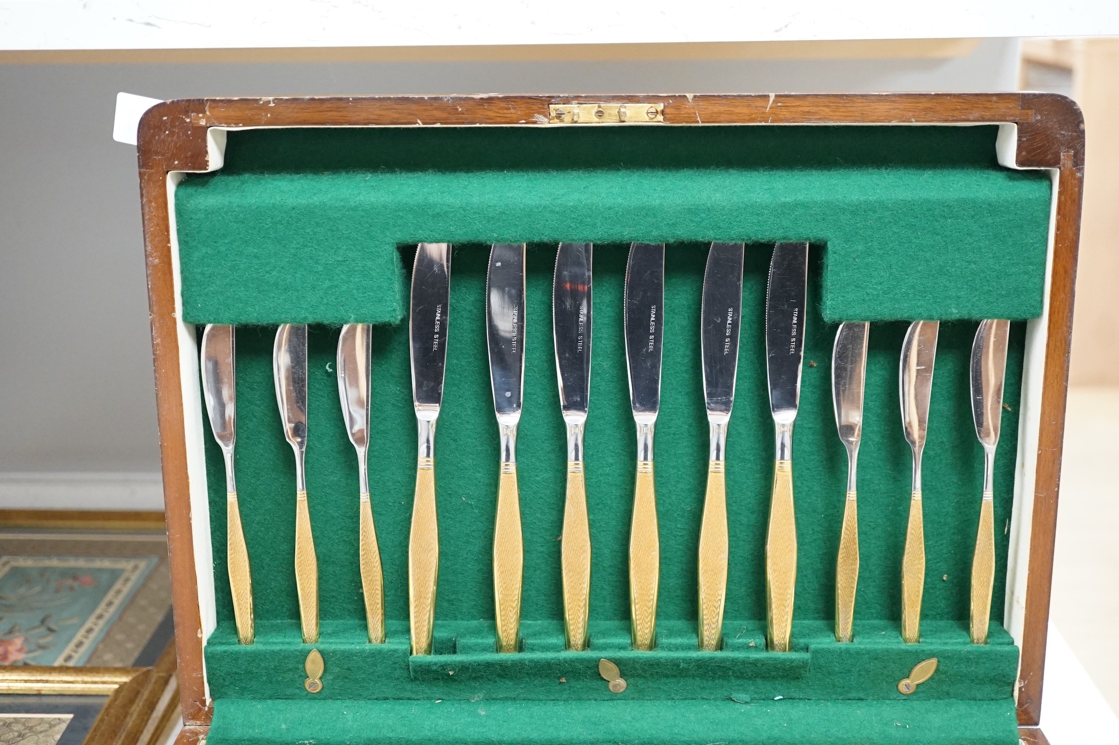 A 1960's parcel gilt canteen of cutlery, 40cm wide